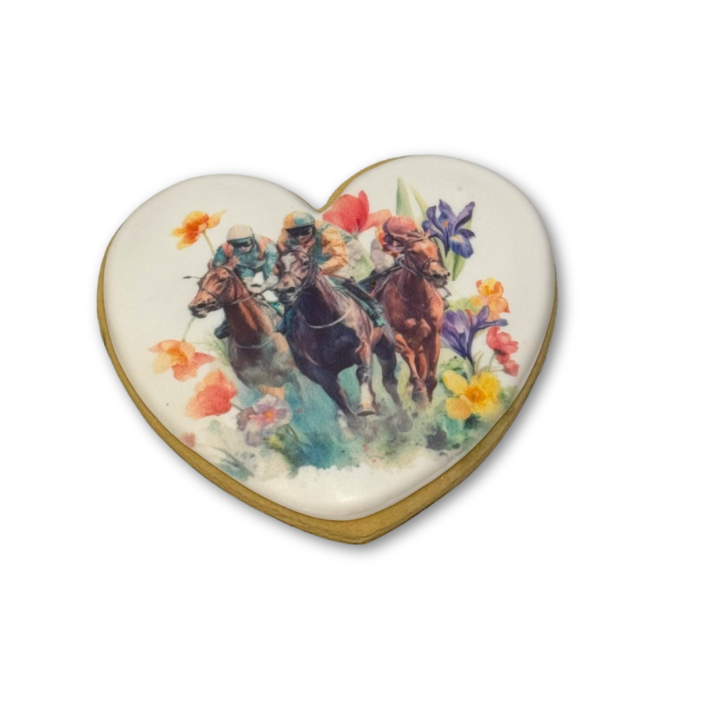 Heart-shaped Kentucky Derby cookie with horse racing art.