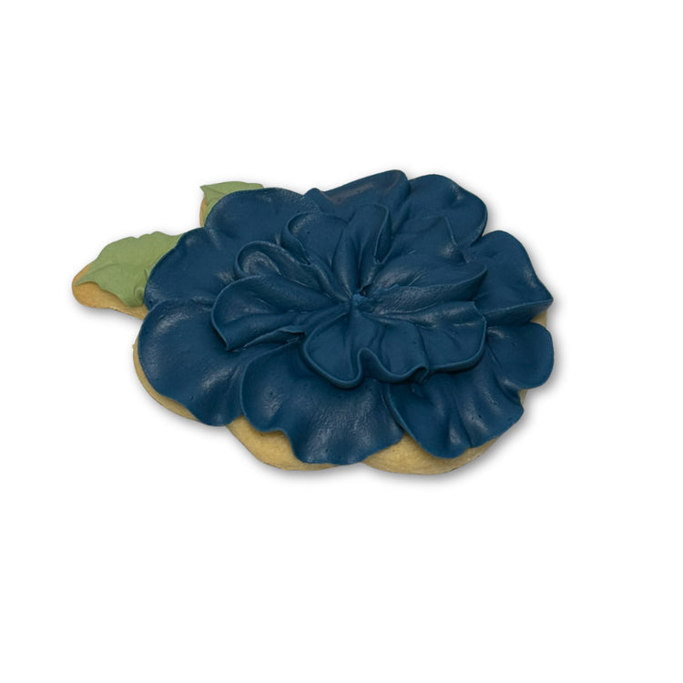 Kentucky Derby cookie shaped like a dark blue flower.