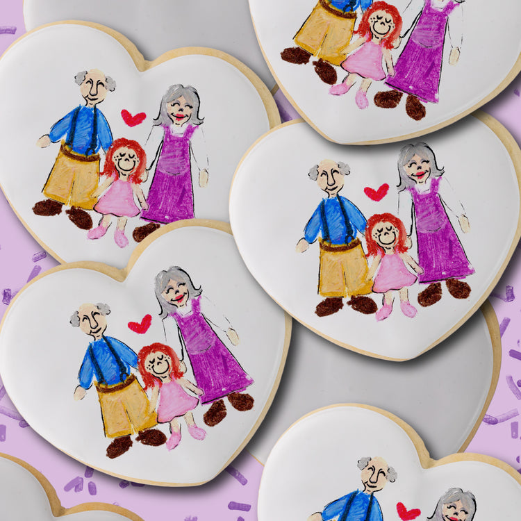 Kiddo Cookie Creations heart-shaped cookies with family art.