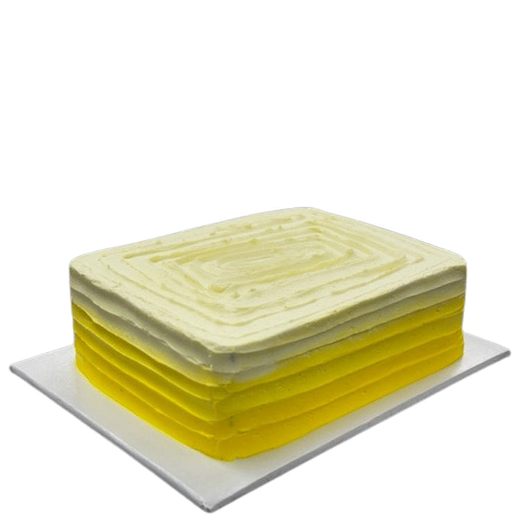 Luscious Lemon sheet cake with yellow ombre frosting.