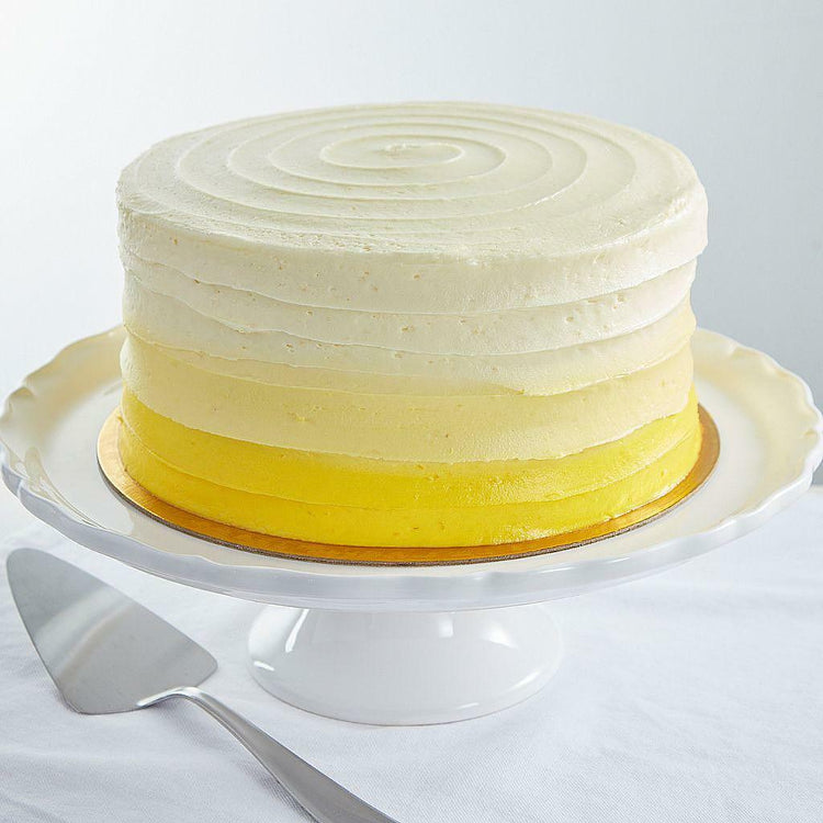 9-inch Luscious Lemon Cake with a yellow ombre frosting.