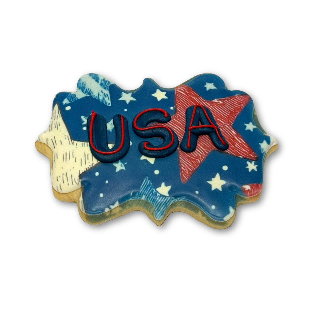 Memorial Day cookie with blue USA icing and star patterns.