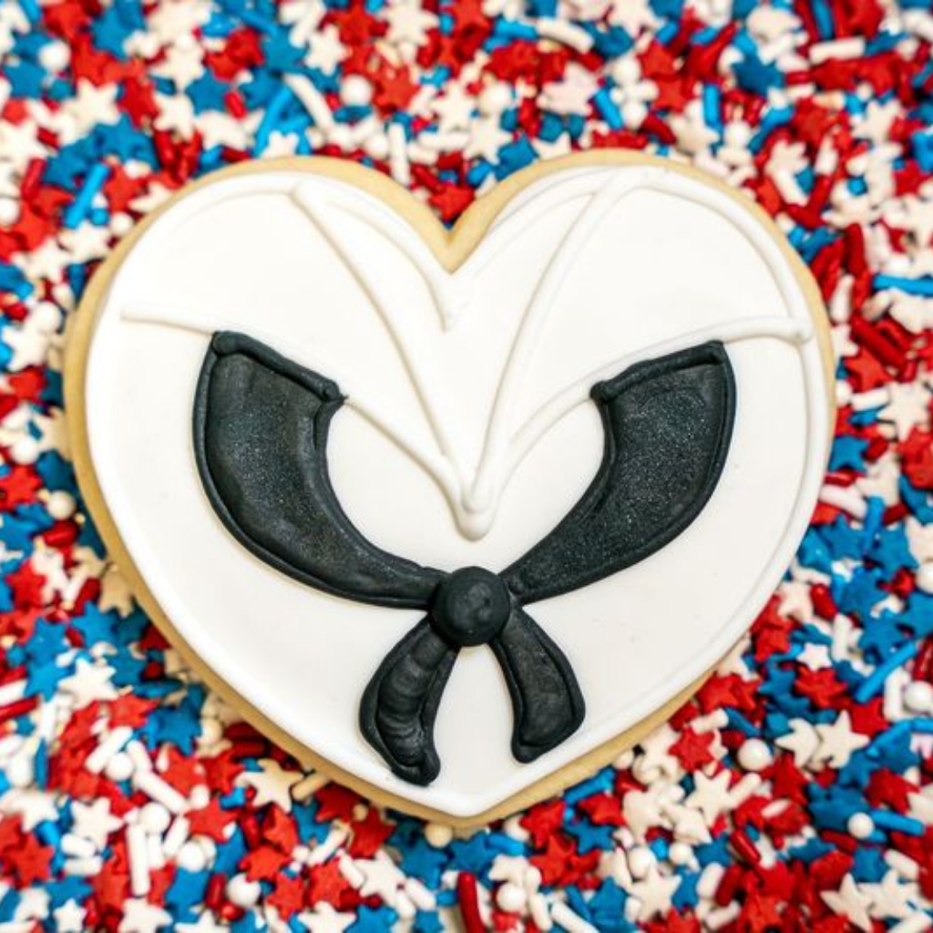 Heart-shaped Memorial Day cookie with sailor collar icing.