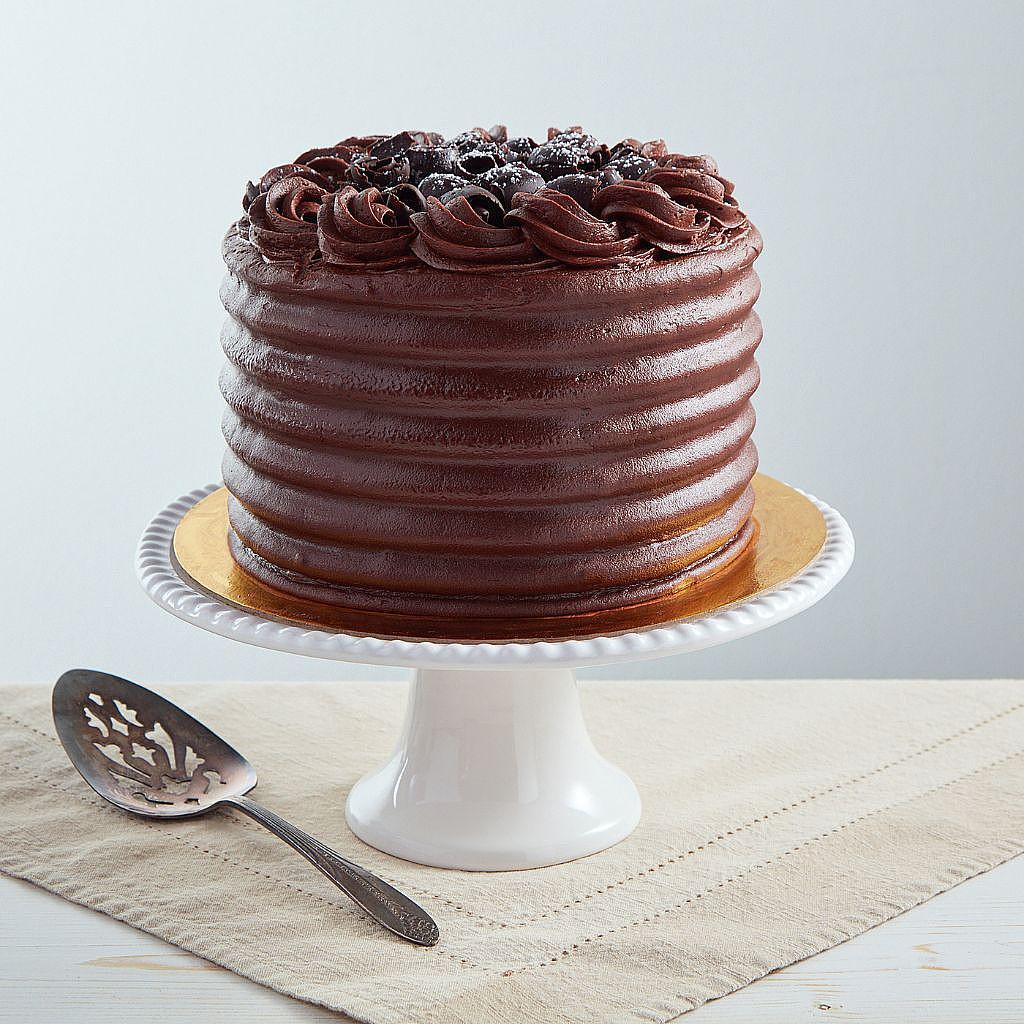 6-inch Mom's Chocolate Cake with ridged frosting on a stand