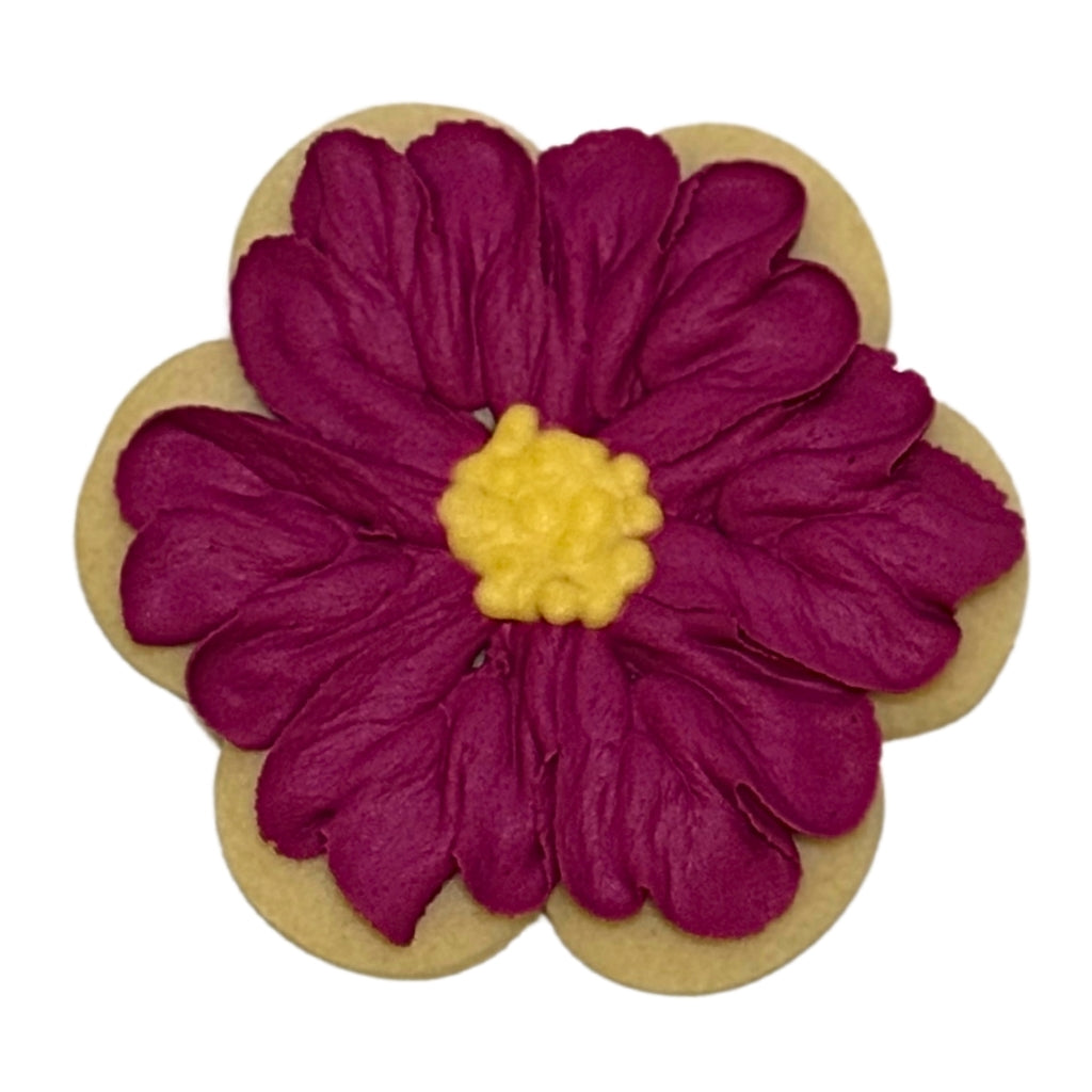 Mother's Day flower cookie with purple and yellow icing.