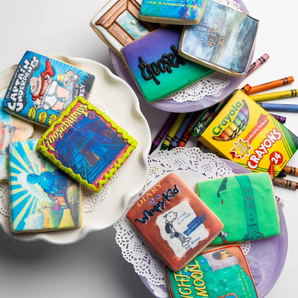 Assorted National Reading Month cookies with book cover designs.