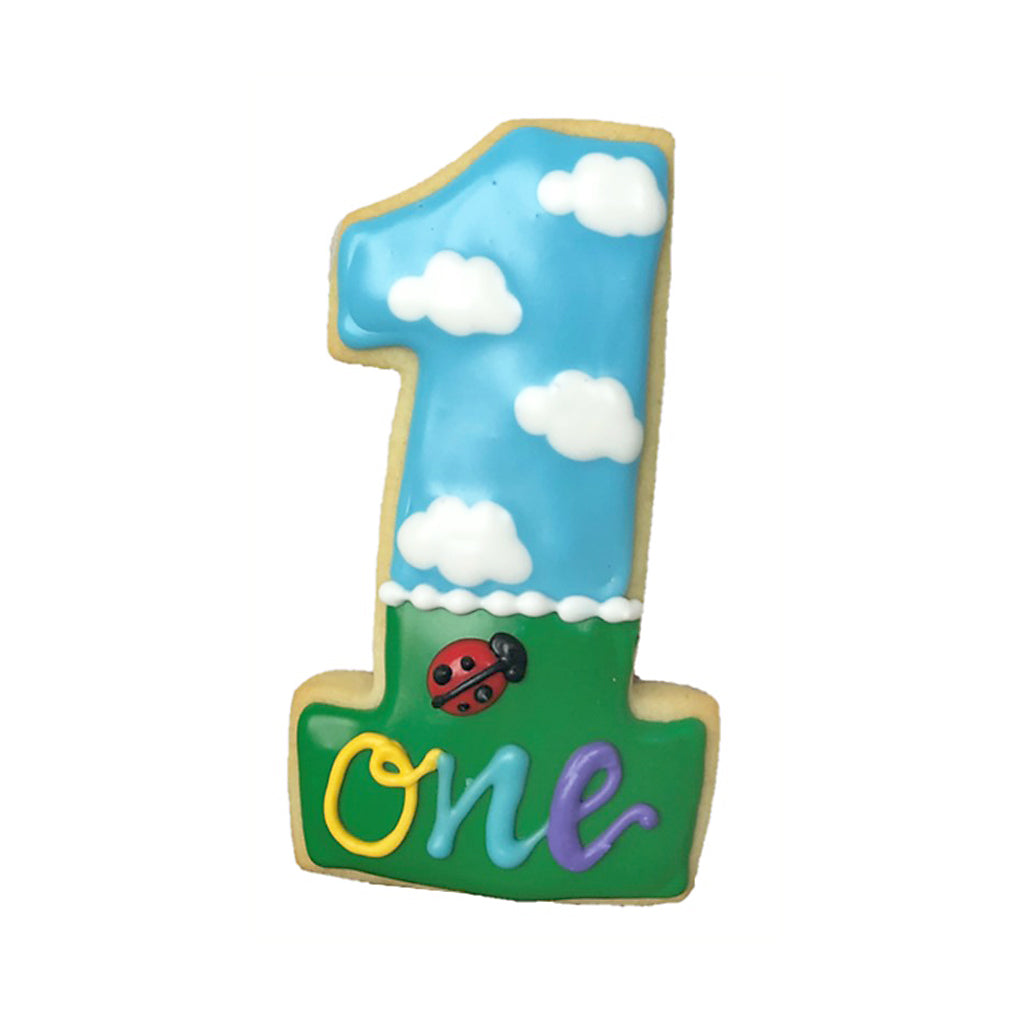 Ladybug numbers cookie shaped like the number one with clouds.