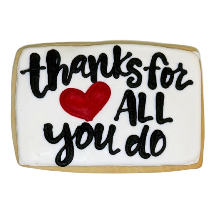 Nurse Appreciation cookie with black text and a red heart.