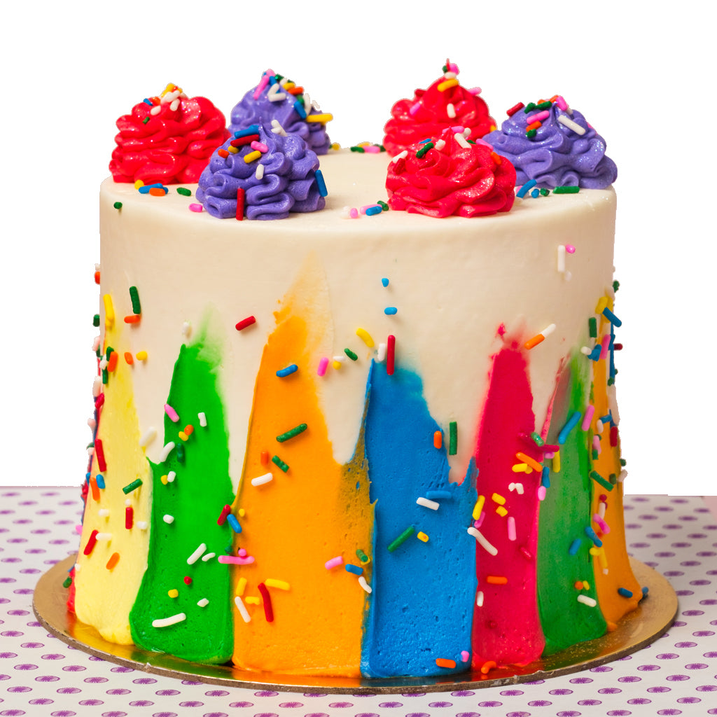 6-inch Pride cake with rainbow stripes and colorful sprinkles.