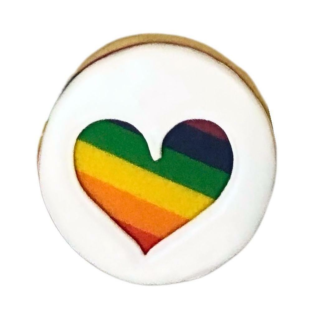 Everything's Coming Up Rainbows cookie with heart cutout