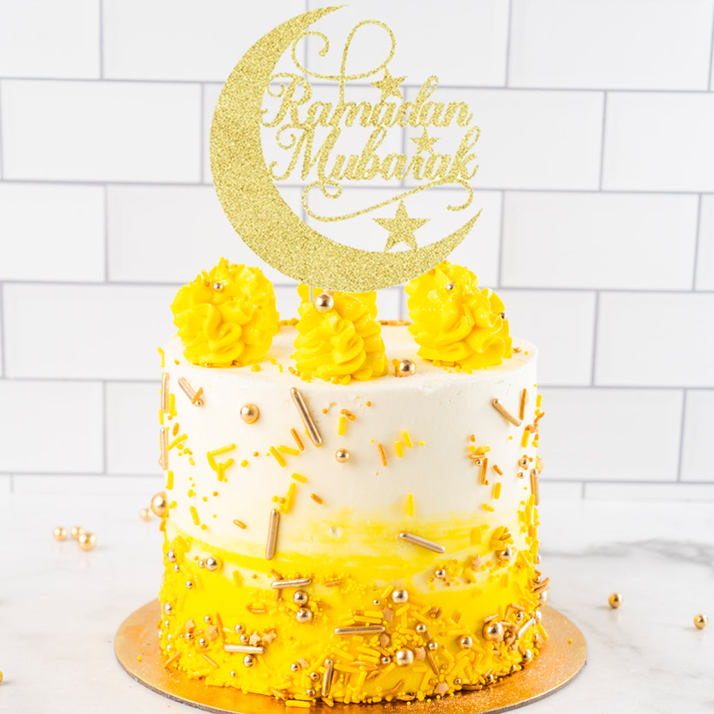 6-inch Ramadan cake with yellow ombre frosting and gold topper.