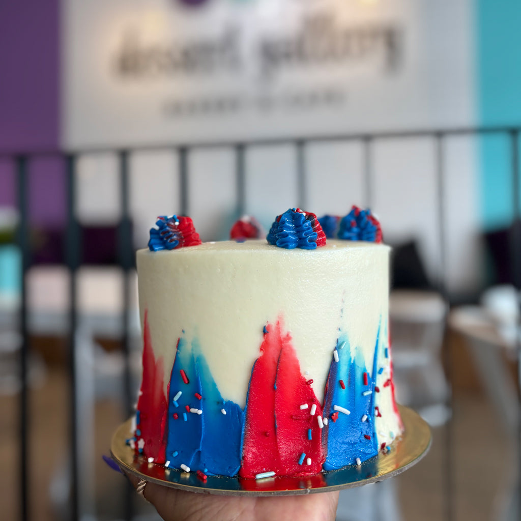 6-inch Red, White & Blue cake with frosted buttercream.