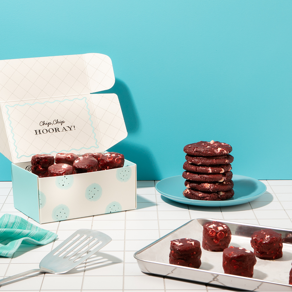Red Velvet White Chocolate Dough in a box and on a blue plate