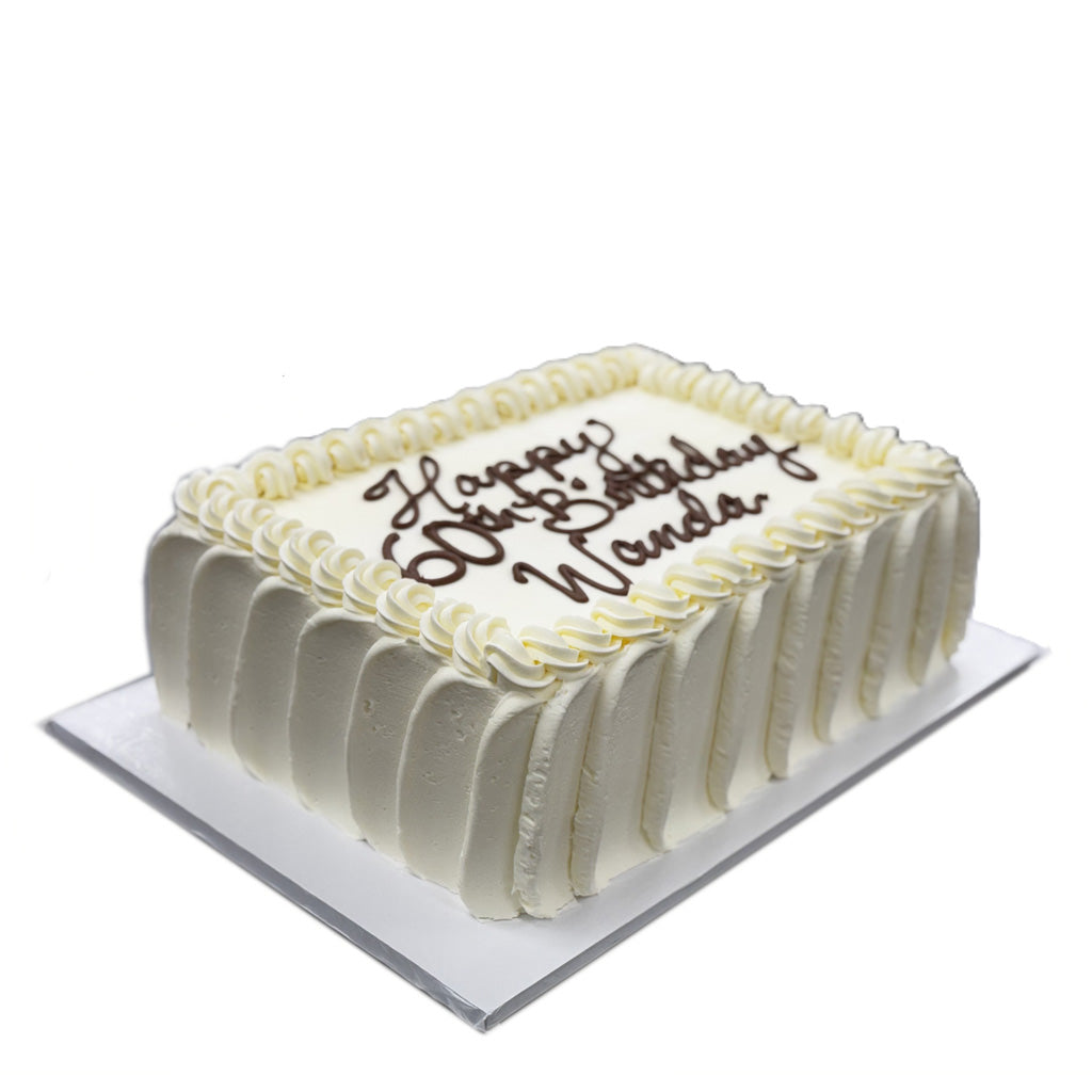 French Vanilla sheet cake with white frosting and script text.