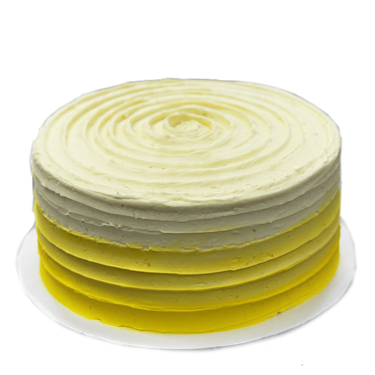 Luscious lemon cake with a yellow ombre frosted finish.