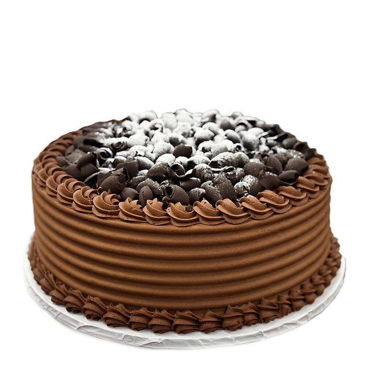 Mom's chocolate cake with dark chocolate curls and frosting.