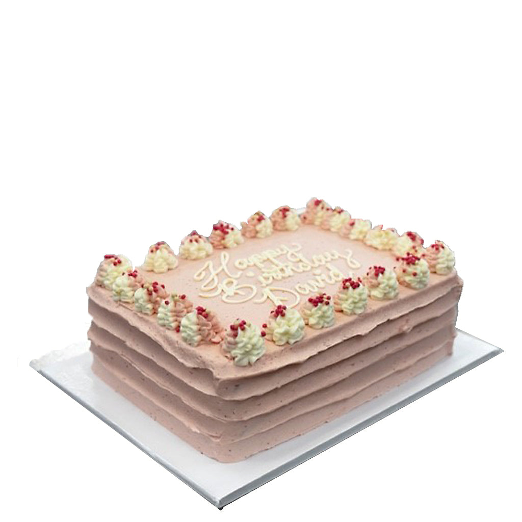 Strawberry Dream sheet cake with pink frosting and piped border.