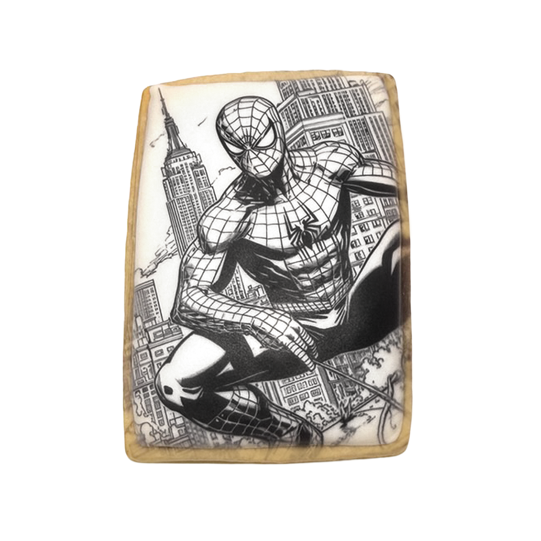 Spiderman cookie with black and white comic book city design.