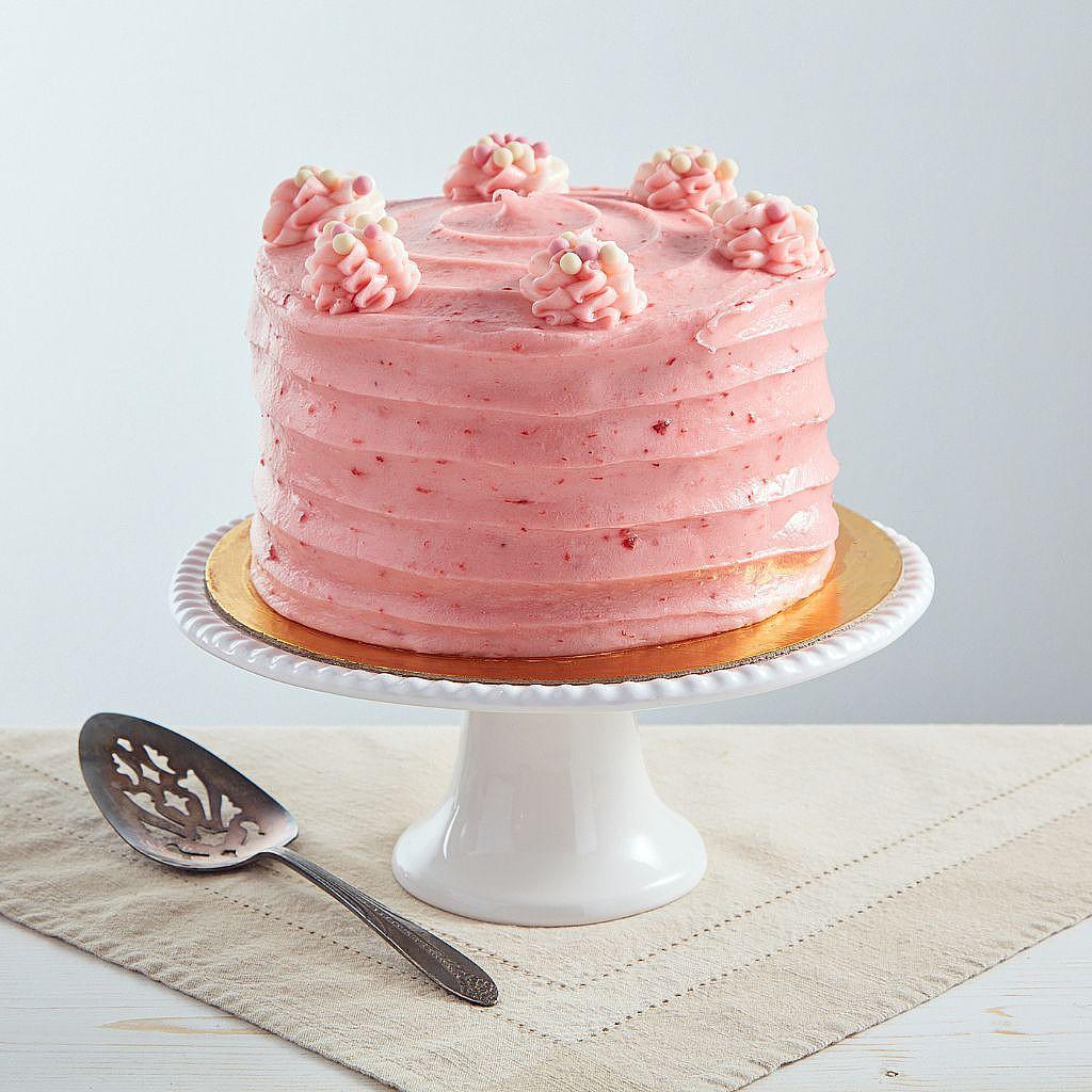 6-inch Strawberry Dream Cake with pink frosting on a stand
