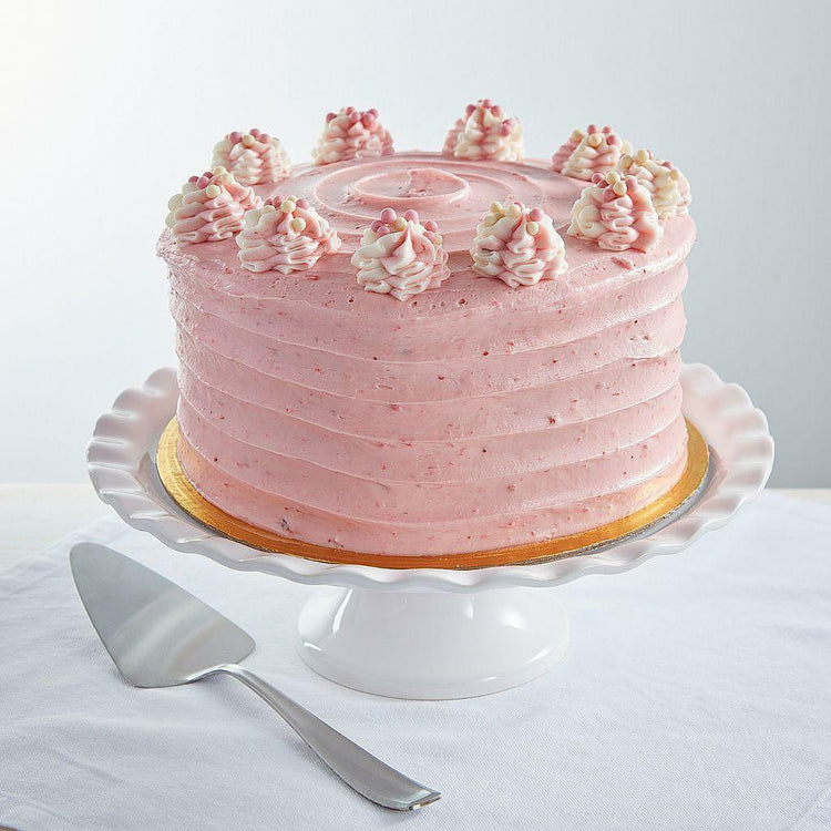 9-inch Strawberry Dream Cake with pink frosting on a cake stand.