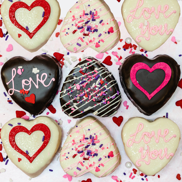 Valentine's Day 2025 heart-shaped cookies with icing and sprinkles