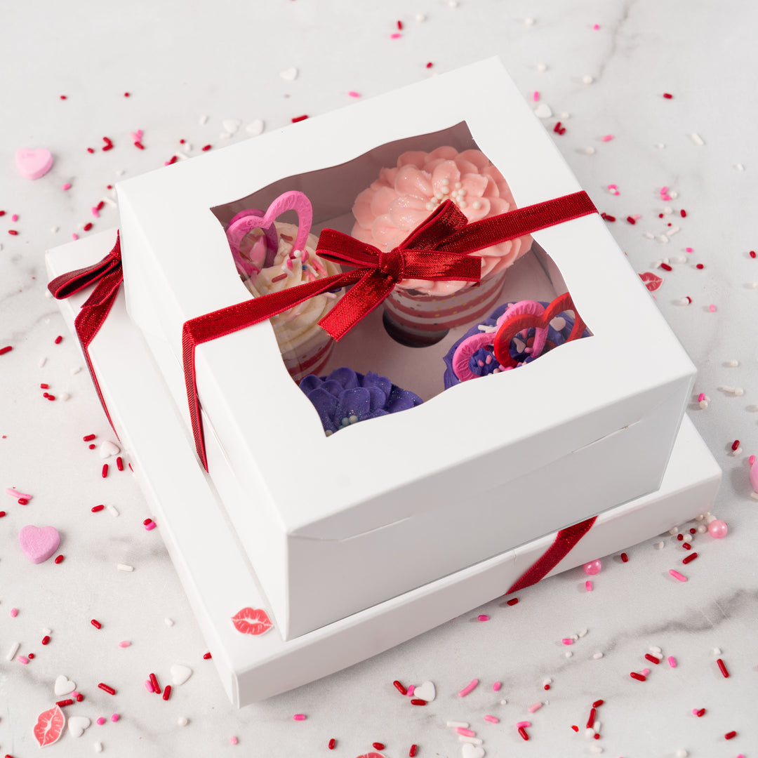 Valentine's Day cupcake collection in a white gift box with red ribbon