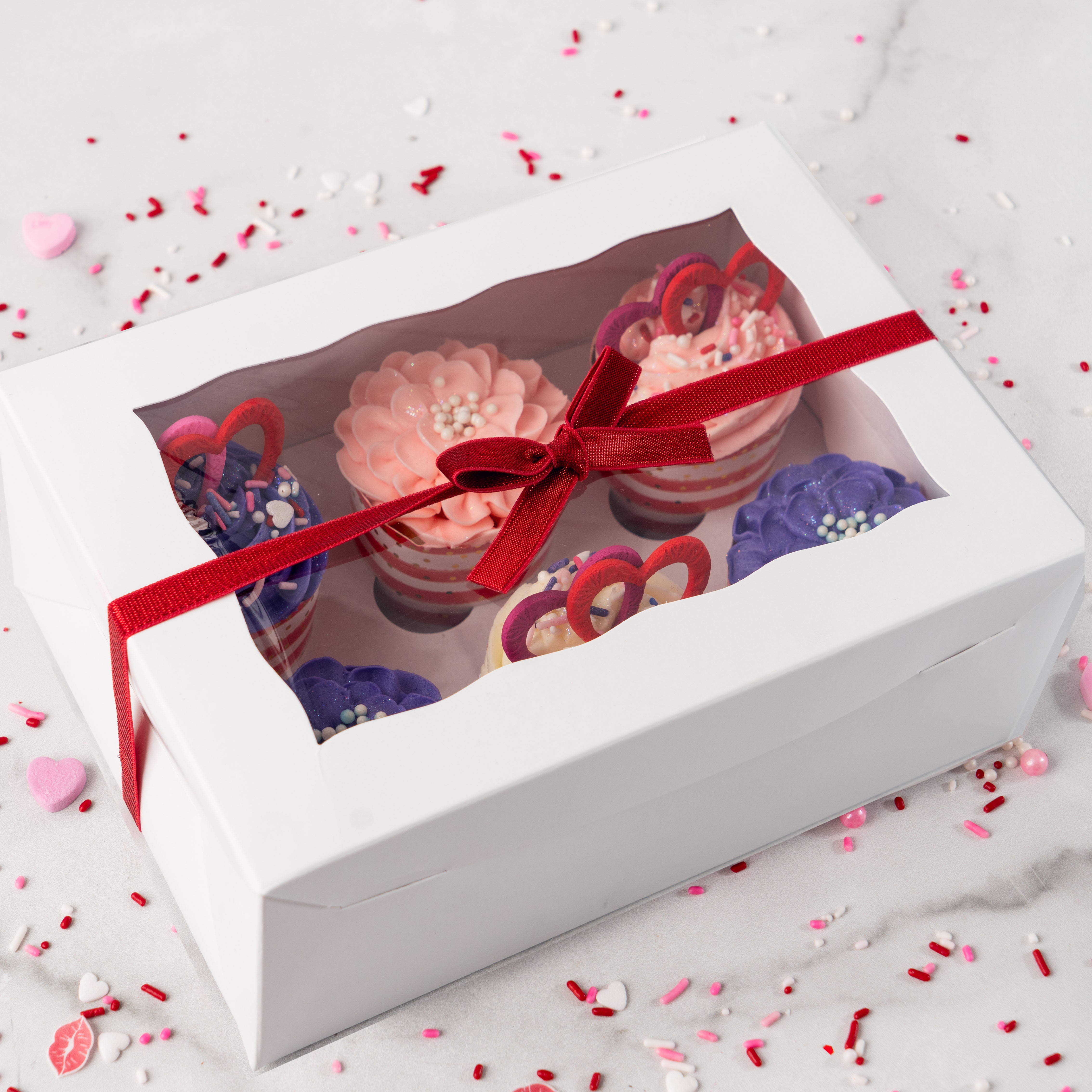Valentine's Day cupcake collection in a white gift box.