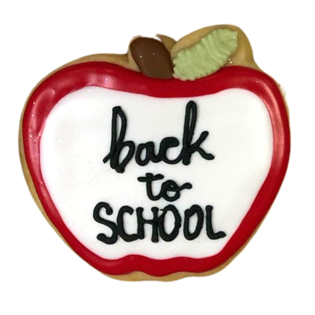 Apple-shaped Back To School cookie with red and white icing.