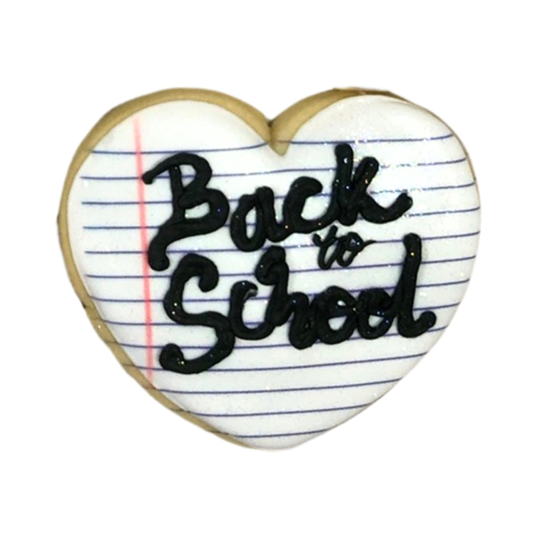 Heart-shaped Back to School cookie with lined paper design.