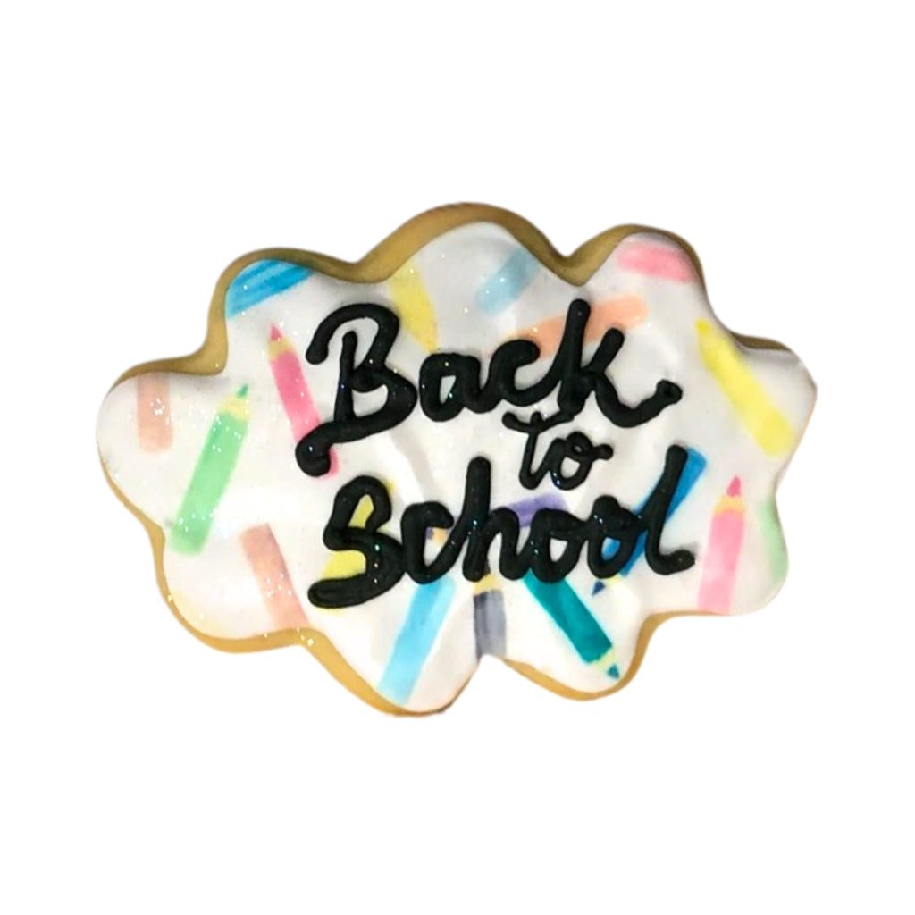 Back to School cookie with colorful pencil icing design