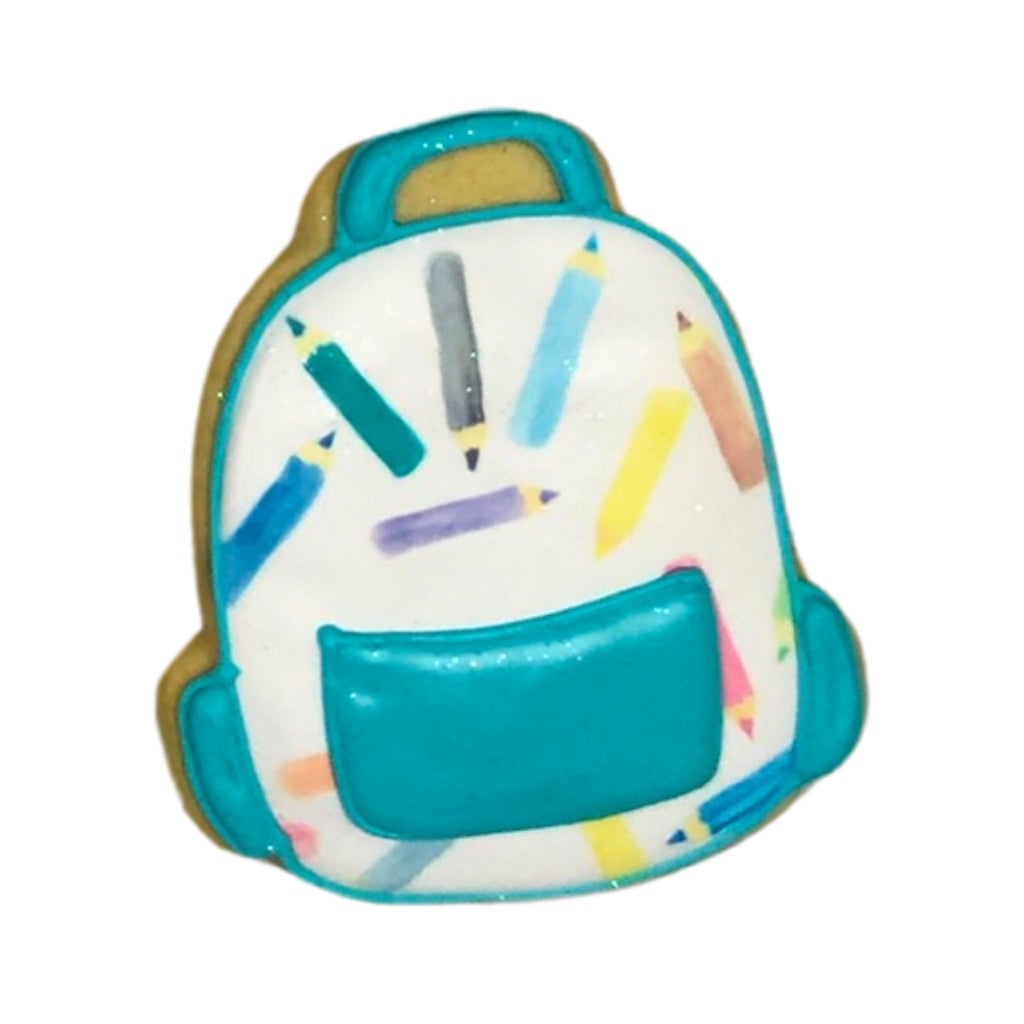 Back to School cookie shaped like a backpack with pencil print.
