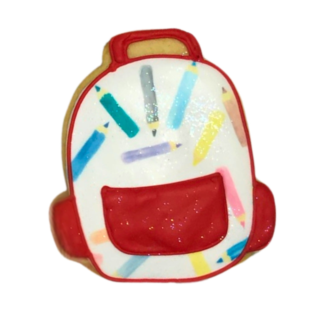 Back to school backpack cookie with colorful pencil designs.