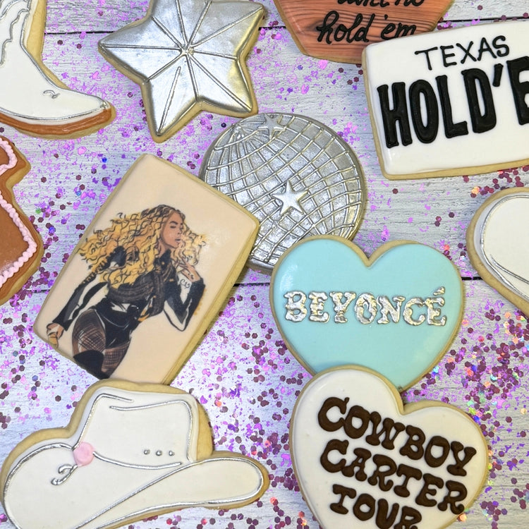 Beyoncé portrait cookie surrounded by themed sugar cookies