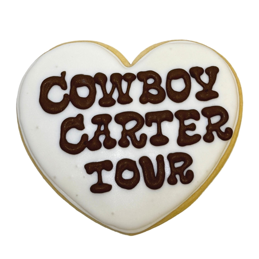 Cowboy Carter heart-shaped sugar cookie with brown icing.
