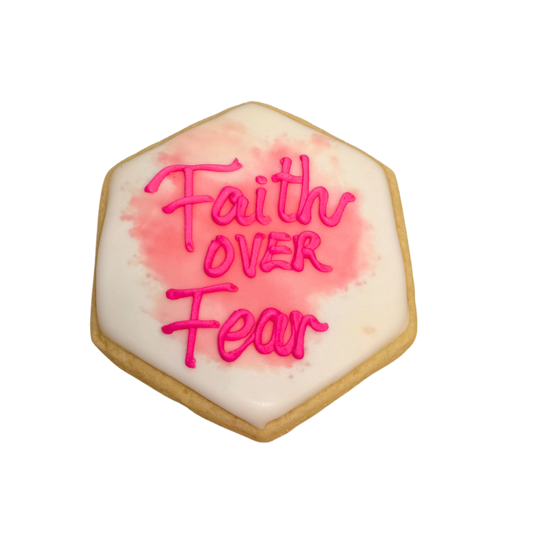Hexagon Breast Cancer Awareness cookie with pink icing text