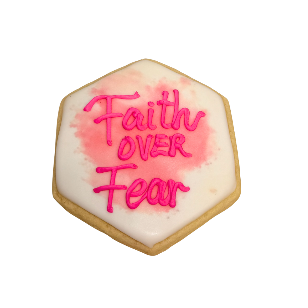 Hexagon Breast Cancer Awareness cookie with pink icing text