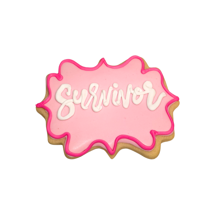 Breast Cancer Awareness cookie with pink Survivor icing.