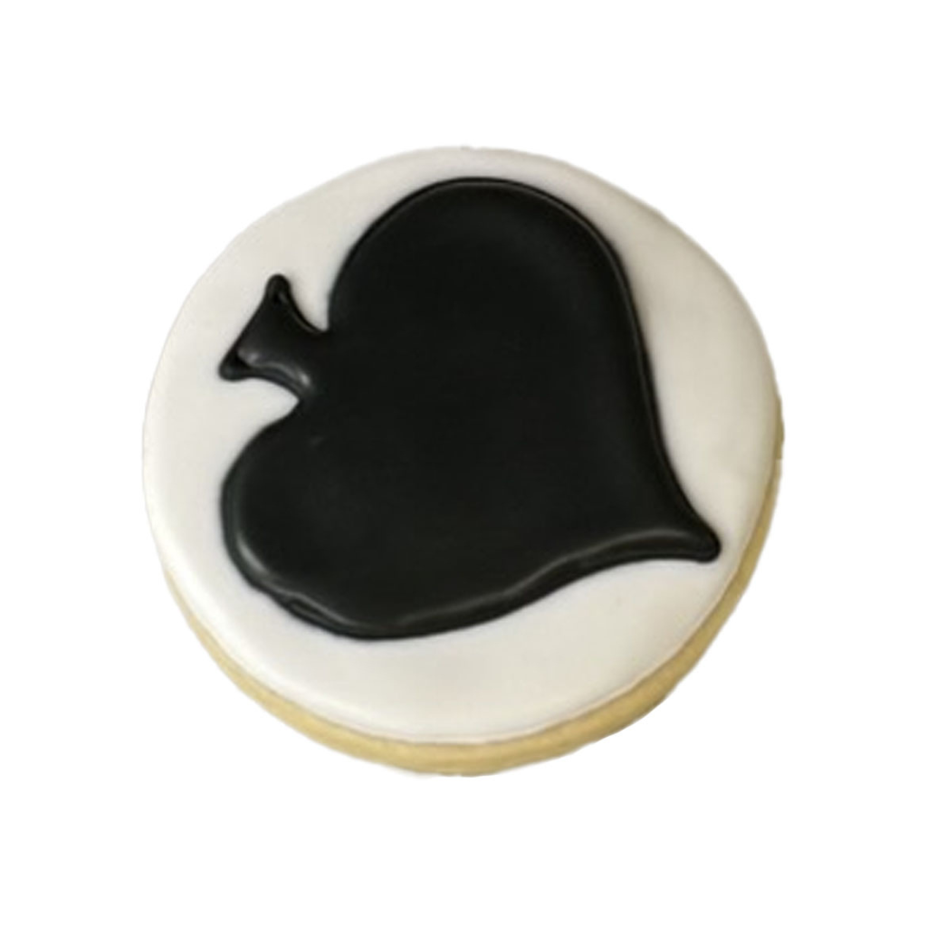 Casino Cookie with a black spade design on white icing.
