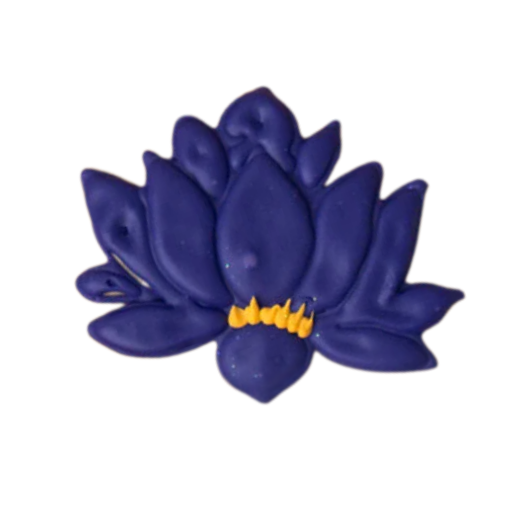Diwali lotus-shaped cookie with purple icing and yellow detail