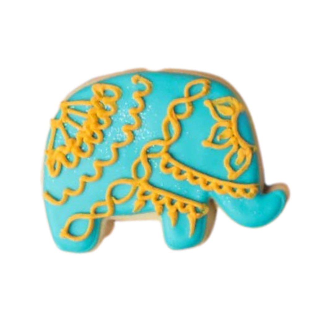 Diwali elephant-shaped cookie with blue icing and gold piping.