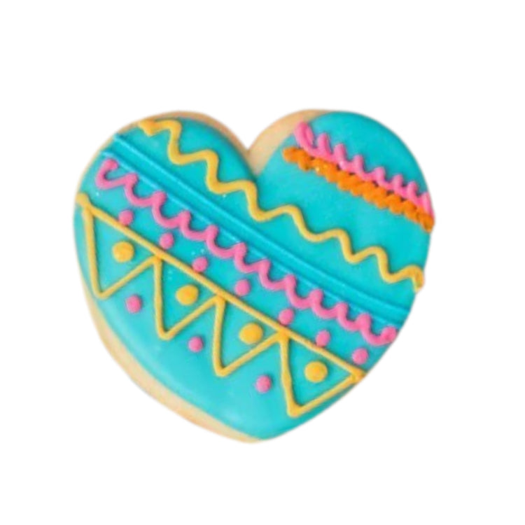 Diwali heart-shaped cookie with blue icing and colorful patterns