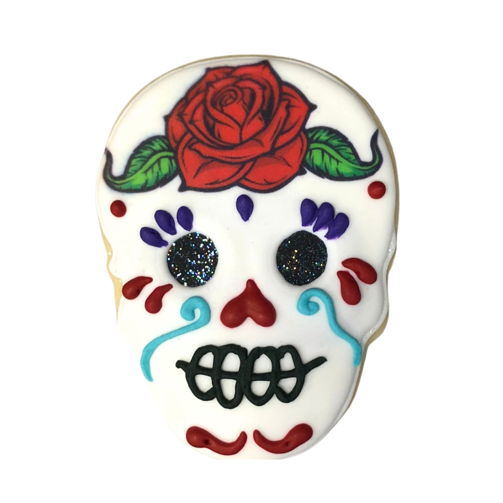 Day of the Dead sugar cookie with a red rose and glitter eyes.