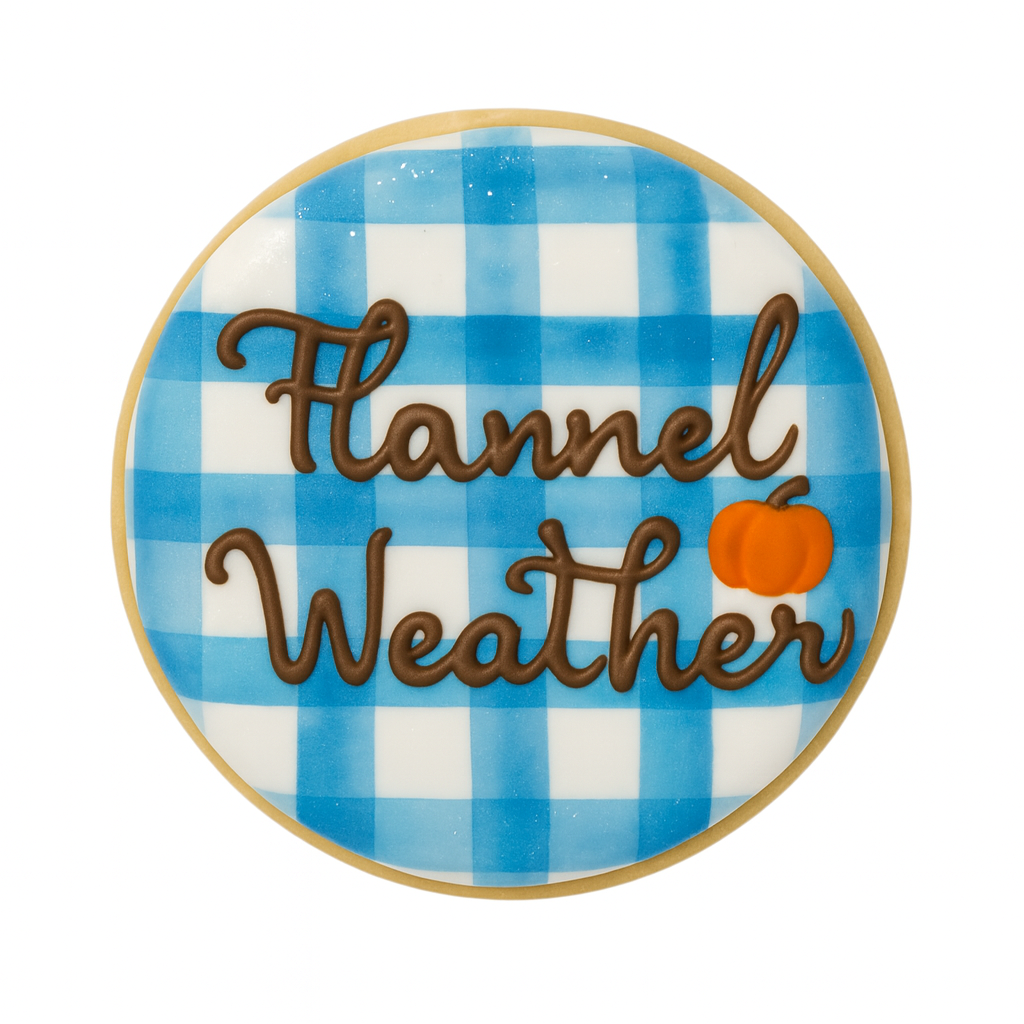 Fall cookie with blue plaid pattern and Flannel Weather text