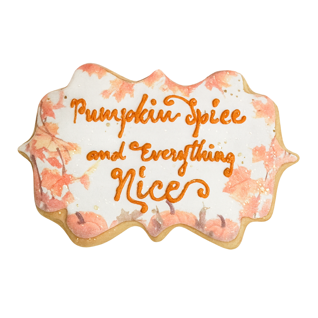 Fall cookie with pumpkin spice and leaf icing design