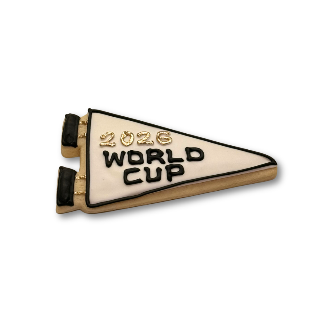 World Cup 2026 pennant-shaped cookie with black icing.