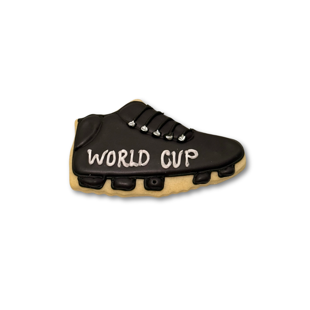 World Cup cookie shaped like a black soccer cleat