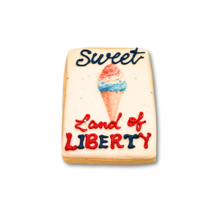 4th of July cookie with ice cream cone and red, white, blue text.