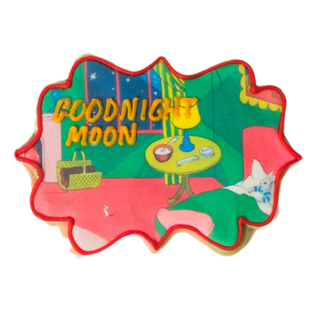 Goodnight Moon themed cookie with red piped icing border.