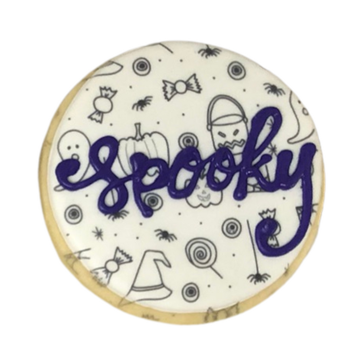 Round Halloween cookie with Spooky text and festive icons.