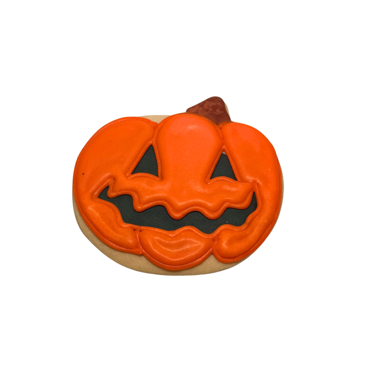 Halloween pumpkin cookie with orange icing and black details
